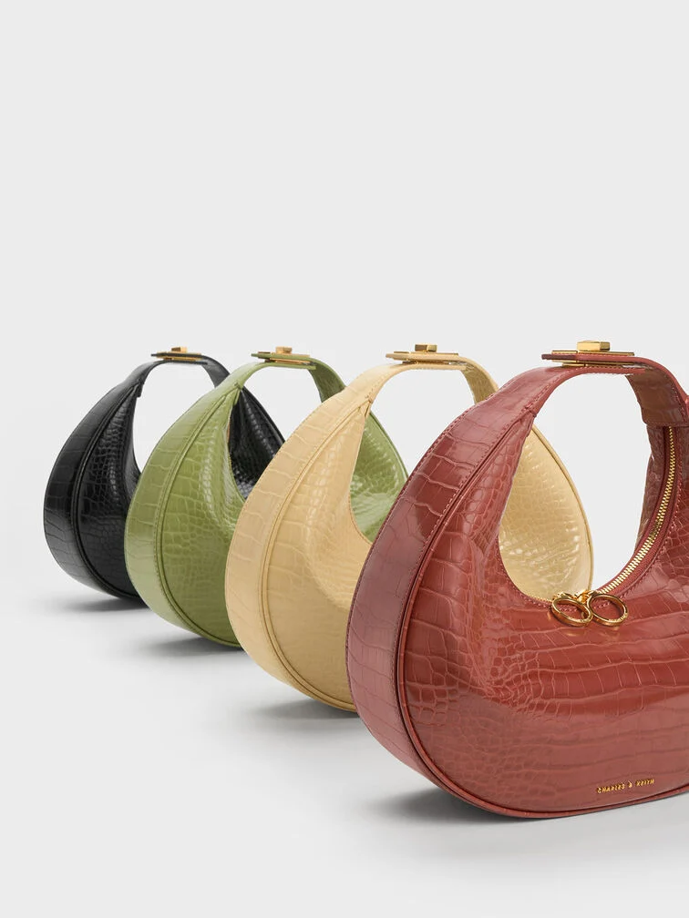 حقيبة هوبو هلالية بنقشة جلد التمساح – بني 